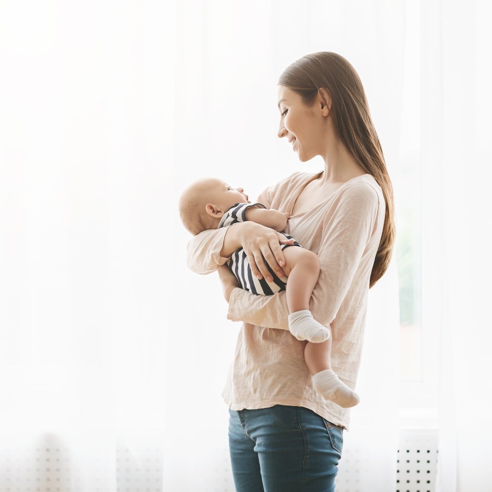 NICU-experienced nurse checking a premature infant on a home monitor in Las Vegas